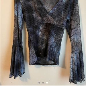 Vintage silk long sleeve w textured wrists. Almost like second skin styled top.